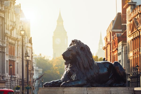 London street at the sunrise. View from Trafalgar Square to Big Ben at the sunrise.